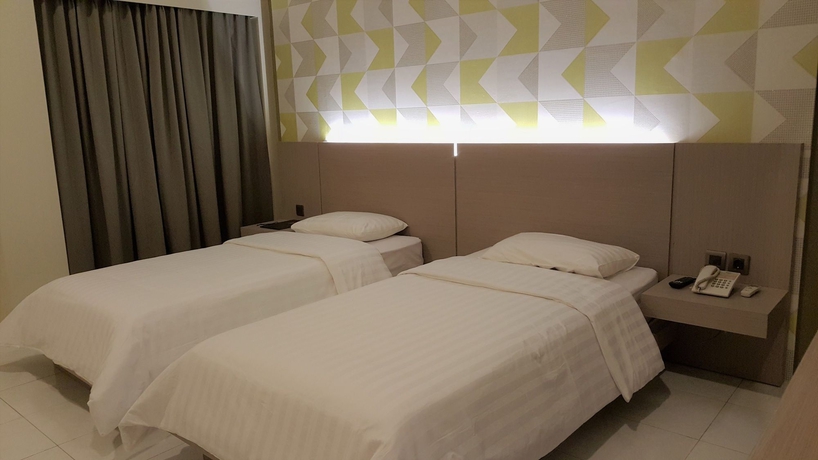 Imagen de la habitación del Hotel Griya Asri. Foto 9