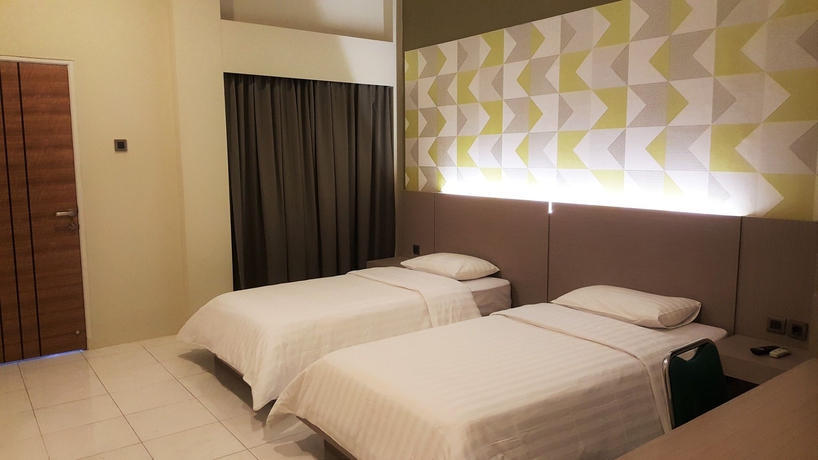 Imagen de la habitación del Hotel Griya Asri. Foto 13