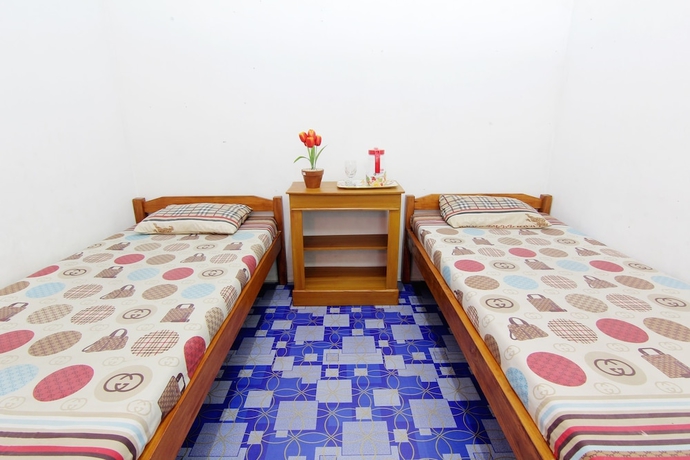 Imagen de la habitación del Hotel Griya Godean Syariah Yogyakarta. Foto 14