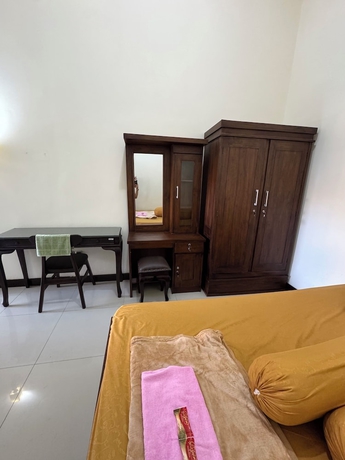 Imagen de la habitación del Hotel Griya Helin. Foto 3