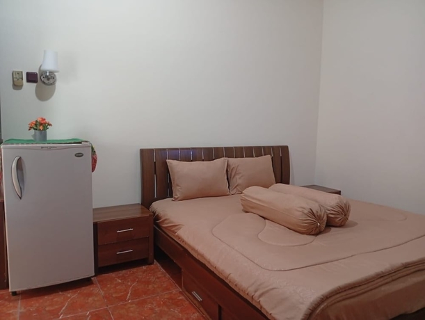 Imagen de la habitación del Hotel Griya Helin. Foto 5