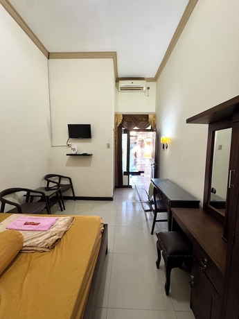 Imagen de la habitación del Hotel Griya Helin. Foto 7
