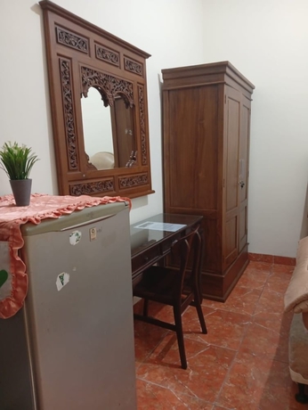 Imagen de la habitación del Hotel Griya Helin. Foto 10
