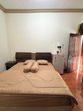 Imagen de la habitación del Hotel Griya Helin. Foto 11