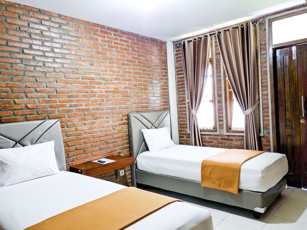 Imagen de la habitación del Hotel Griya Jagadhaya. Foto 3