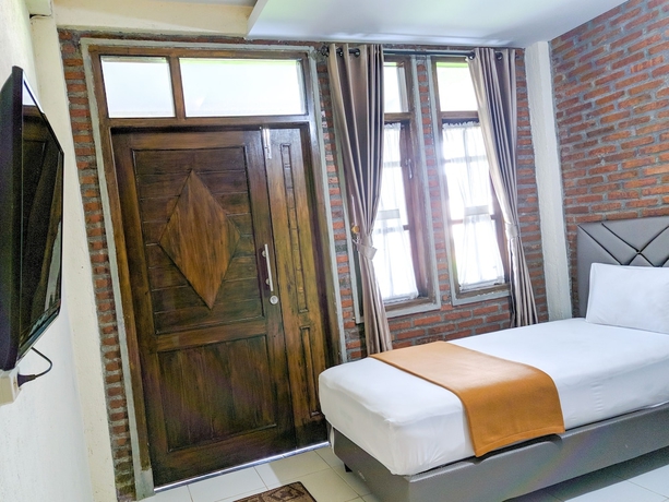 Imagen de la habitación del Hotel Griya Jagadhaya. Foto 9