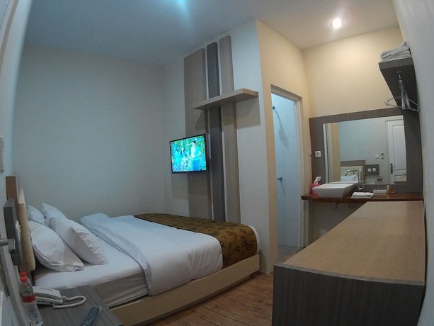 Imagen de la habitación del Hotel Griya Jogja. Foto 6