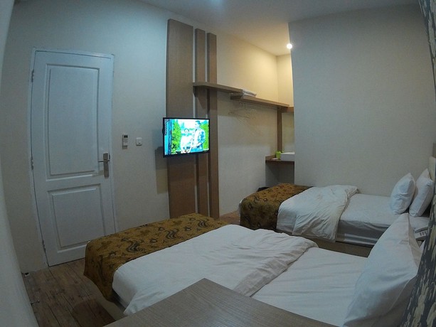 Imagen de la habitación del Hotel Griya Jogja. Foto 11