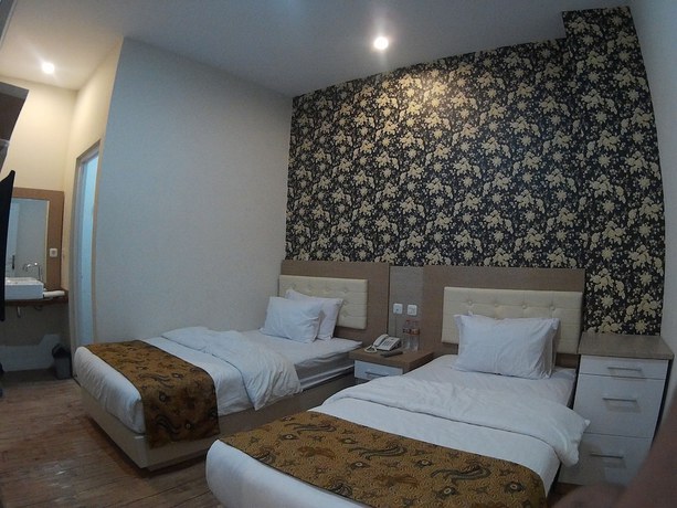 Imagen de la habitación del Hotel Griya Jogja. Foto 18