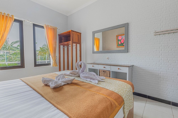 Imagen de la habitación del Hotel Griya Katarina. Foto 2
