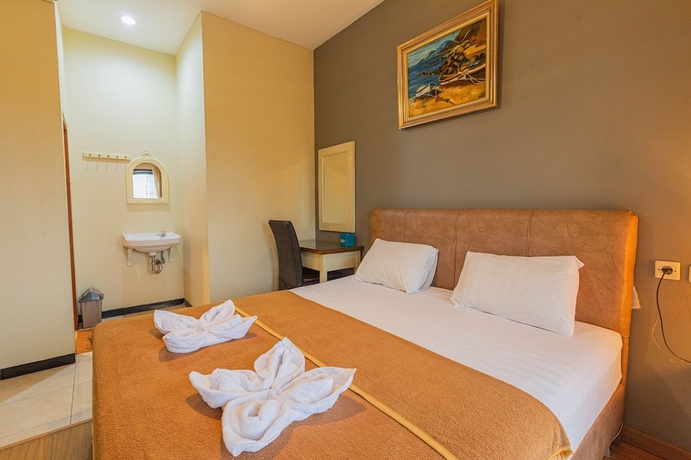 Imagen de la habitación del Hotel Griya Katarina. Foto 4