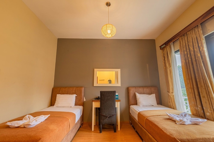 Imagen de la habitación del Hotel Griya Katarina. Foto 5