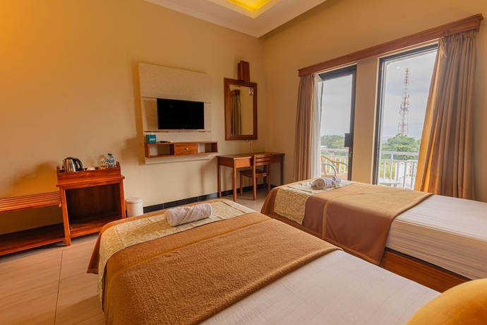 Imagen de la habitación del Hotel Griya Katarina. Foto 6
