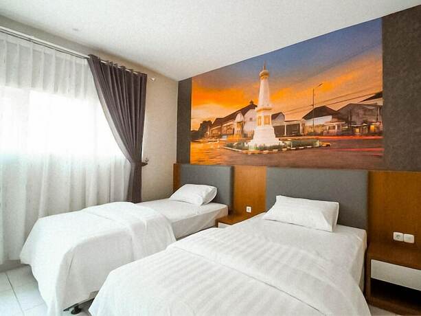 Imagen de la habitación del Hotel Griya Misty. Foto 22
