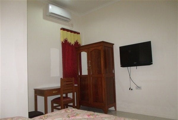 Imagen de la habitación del Hotel Griya Rambutan Barat. Foto 6