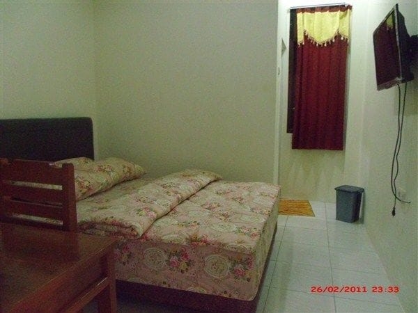 Imagen de la habitación del Hotel Griya Rambutan Barat. Foto 8