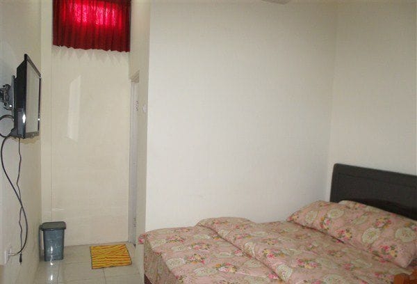 Imagen de la habitación del Hotel Griya Rambutan Barat. Foto 9