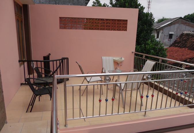 Imagen de la habitación del Hotel Griya Rambutan Barat. Foto 10