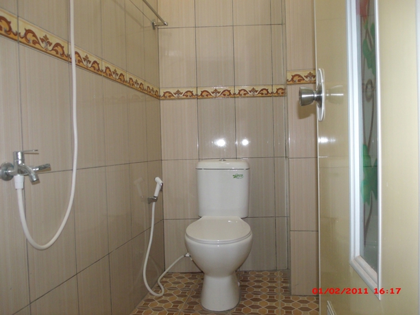 Imagen de la habitación del Hotel Griya Rambutan Barat. Foto 11