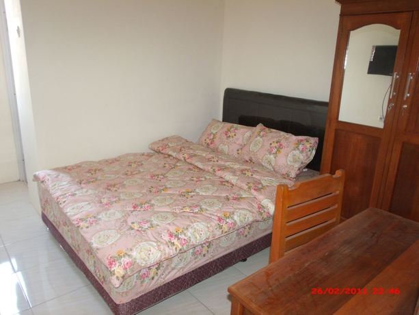 Imagen de la habitación del Hotel Griya Rambutan Barat. Foto 12