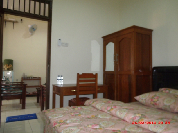 Imagen de la habitación del Hotel Griya Rambutan Barat. Foto 13