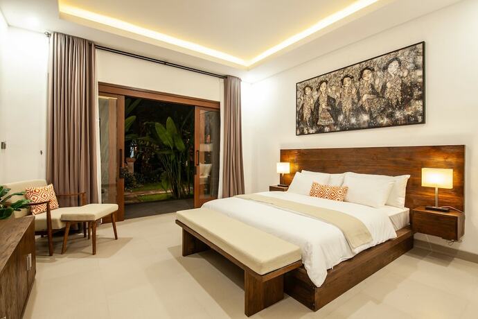 Imagen de la habitación del Hotel Griya Shanti Suites. Foto 17