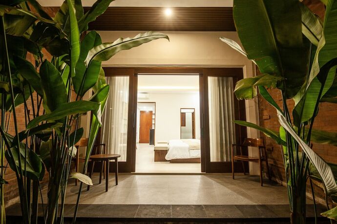 Imagen de la habitación del Hotel Griya Shanti Suites. Foto 19