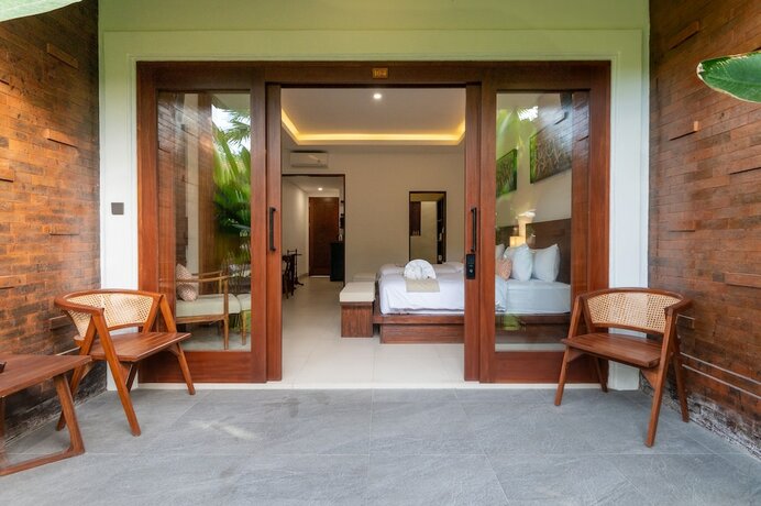 Imagen de la habitación del Hotel Griya Shanti Suites. Foto 20