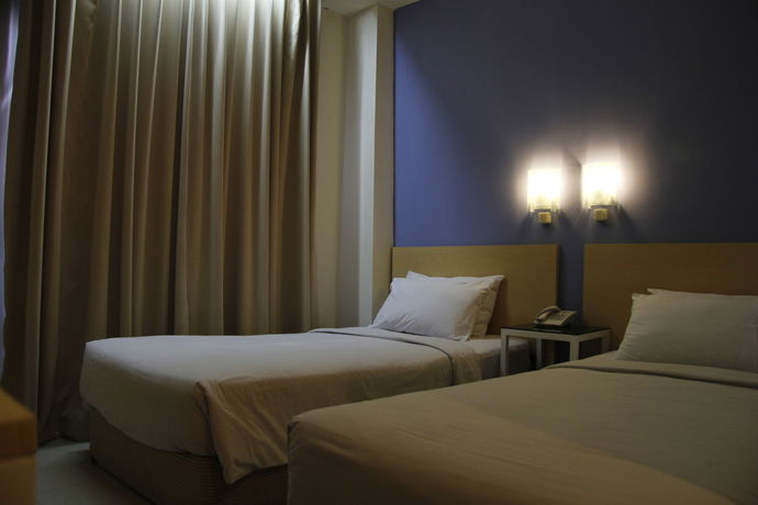 Imagen de la habitación del Hotel Griya Sintesa. Foto 8