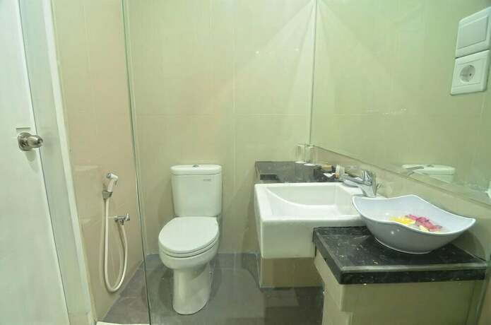Imagen de la habitación del Hotel Griya Sunset Kuta. Foto 12