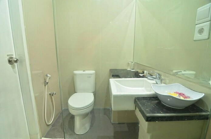 Imagen de la habitación del Hotel Griya Sunset Kuta. Foto 15