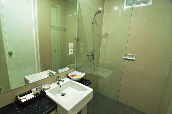 Imagen de la habitación del Hotel Griya Sunset Kuta. Foto 18