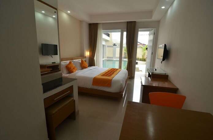 Imagen de la habitación del Hotel Griya Sunset Kuta. Foto 19