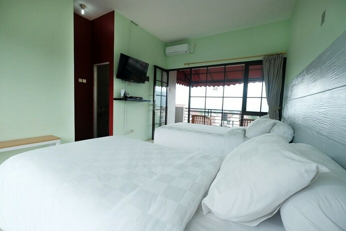 Imagen de la habitación del Hotel Griya Wijaya. Foto 32