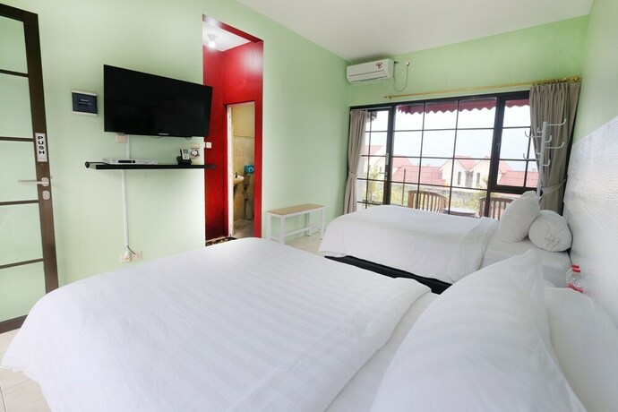 Imagen de la habitación del Hotel Griya Wijaya. Foto 37