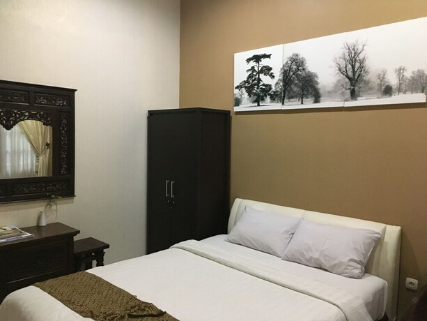 Imagen de la habitación del Hotel Griya Yunika Homestay. Foto 18