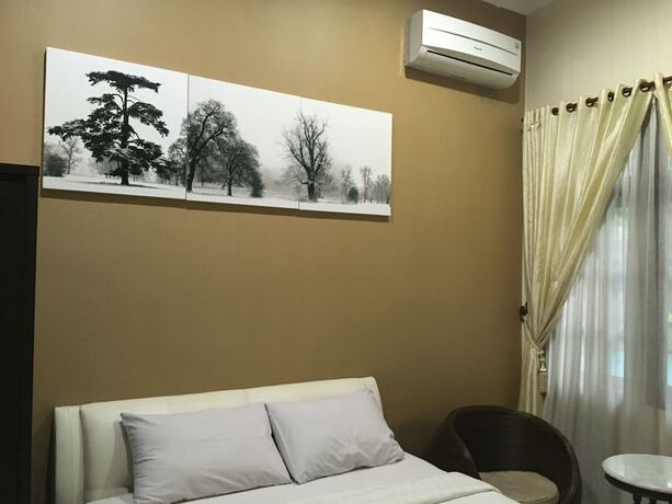 Imagen de la habitación del Hotel Griya Yunika Homestay. Foto 19
