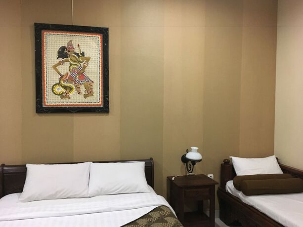Imagen de la habitación del Hotel Griya Yunika Homestay. Foto 21