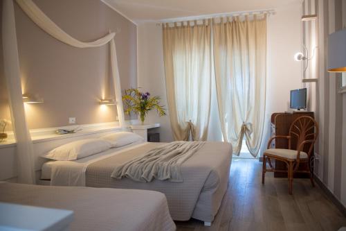 Imagen de la habitación del Hotel Grotta Palazzese Beach, Polignano A Mare. Foto 4