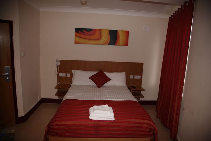 Imagen de la habitación del Hotel Grove Apartments. Foto 4