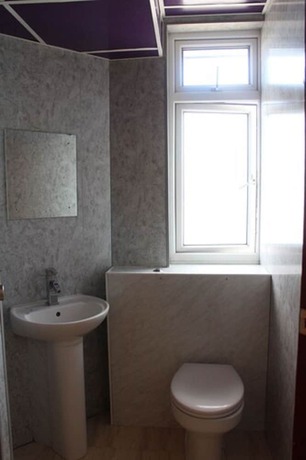 Imagen de la habitación del Hotel Grove Apartments. Foto 7