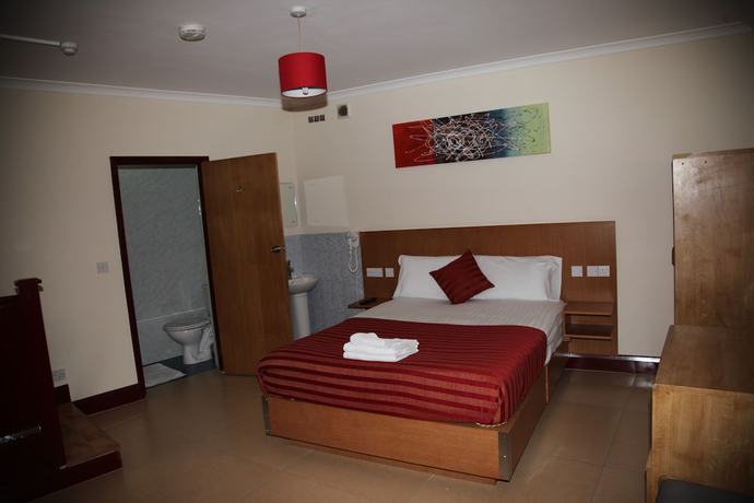 Imagen de la habitación del Hotel Grove Apartments. Foto 9