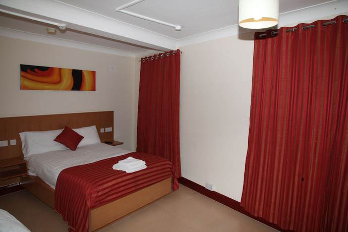 Imagen de la habitación del Hotel Grove Apartments. Foto 13