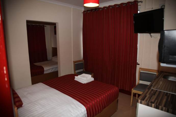 Imagen de la habitación del Hotel Grove Apartments. Foto 15