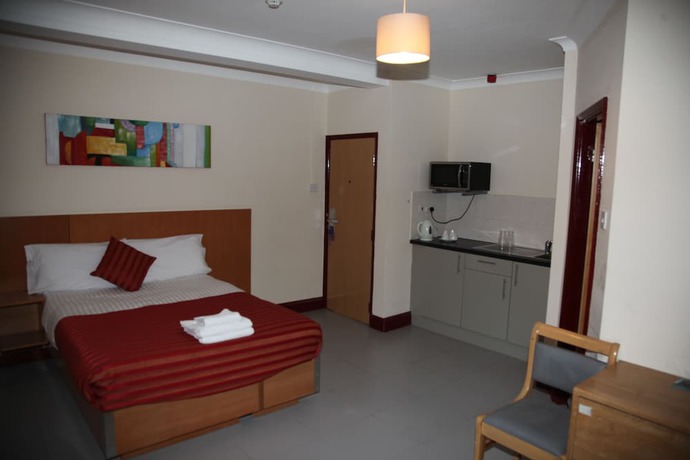 Imagen de la habitación del Hotel Grove Apartments. Foto 16