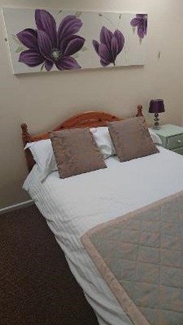 Imagen de la habitación del Hotel Grove House. Foto 10