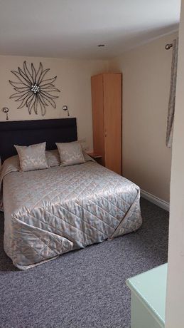 Imagen de la habitación del Hotel Grove House. Foto 12