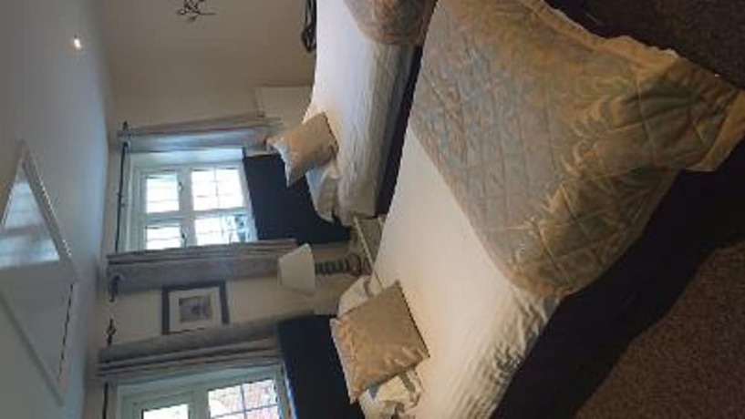 Imagen de la habitación del Hotel Grove House. Foto 18