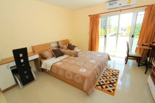 Imagen de la habitación del Hotel Grow Residences. Foto 26