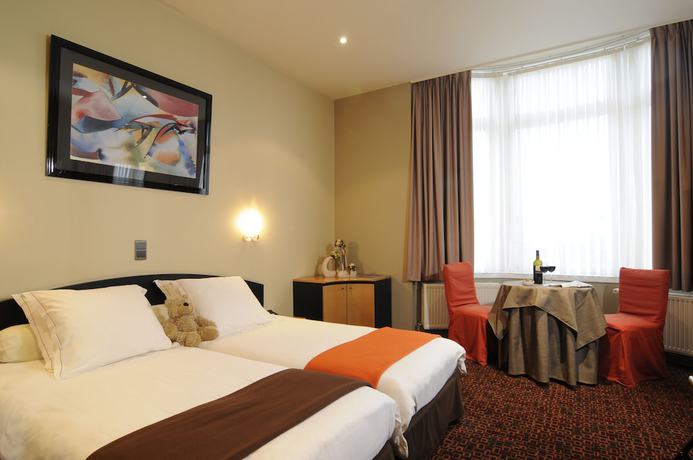 Imagen de la habitación del Hotel Grupello. Foto 12